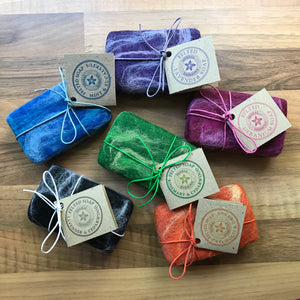 Colourful felted soaps